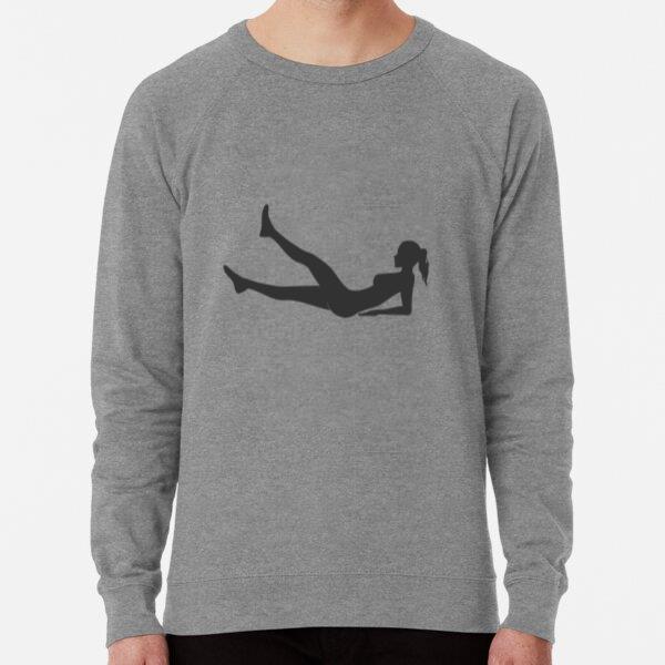 Fitness Woman Silhouette Lifting Legs In Gray Sweatshirt